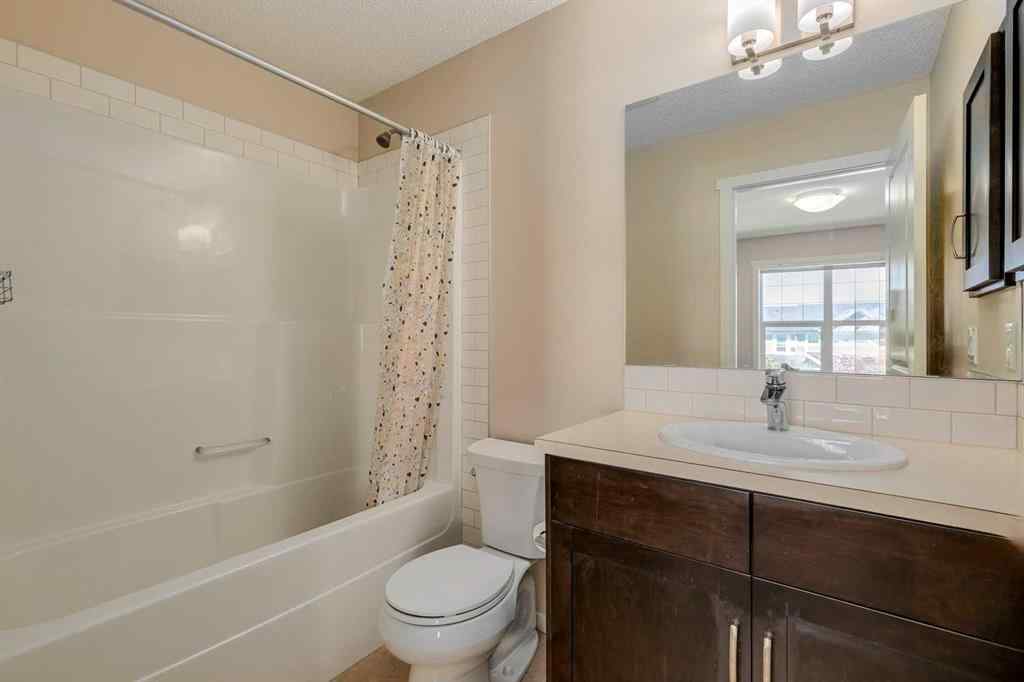 MLS® A2247610 - 44 Sunvalley Road  in Sunset Ridge Cochrane, Residential