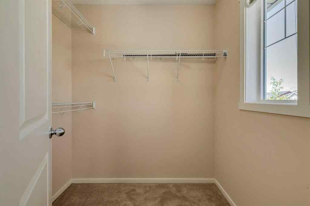 MLS® A2247610 - 44 Sunvalley Road  in Sunset Ridge Cochrane, Residential