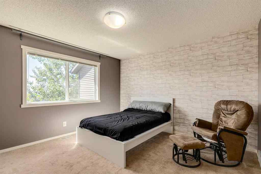 MLS® A2247610 - 44 Sunvalley Road  in Sunset Ridge Cochrane, Residential