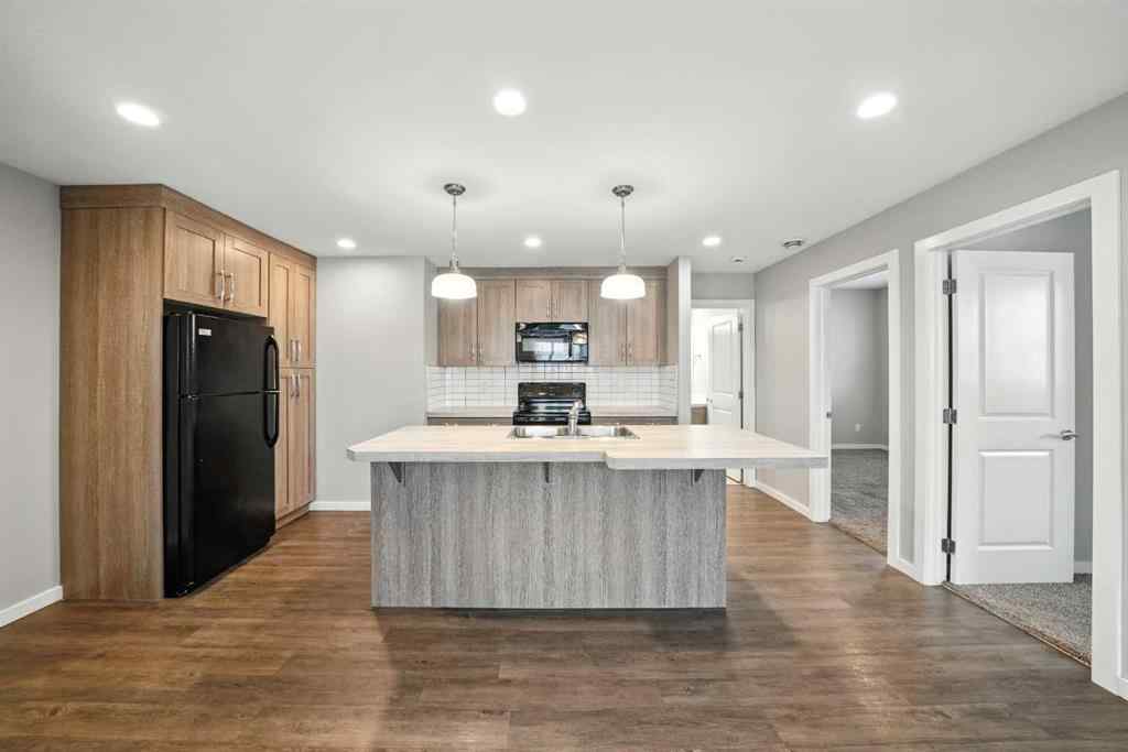 MLS® A2247626 - Unit #100 44 Reid Court  in Ryders Ridge Sylvan Lake, Residential