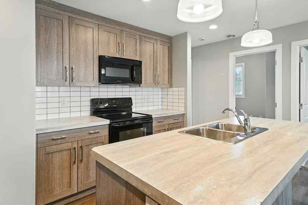 MLS® A2247626 - Unit #100 44 Reid Court  in Ryders Ridge Sylvan Lake, Residential