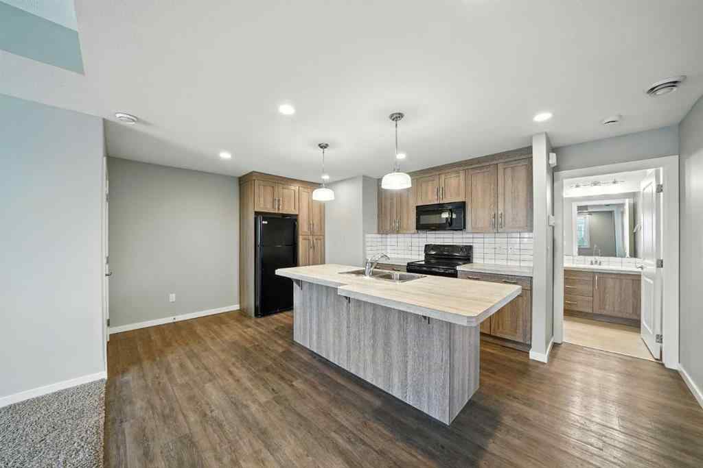 MLS® A2247626 - Unit #100 44 Reid Court  in Ryders Ridge Sylvan Lake, Residential