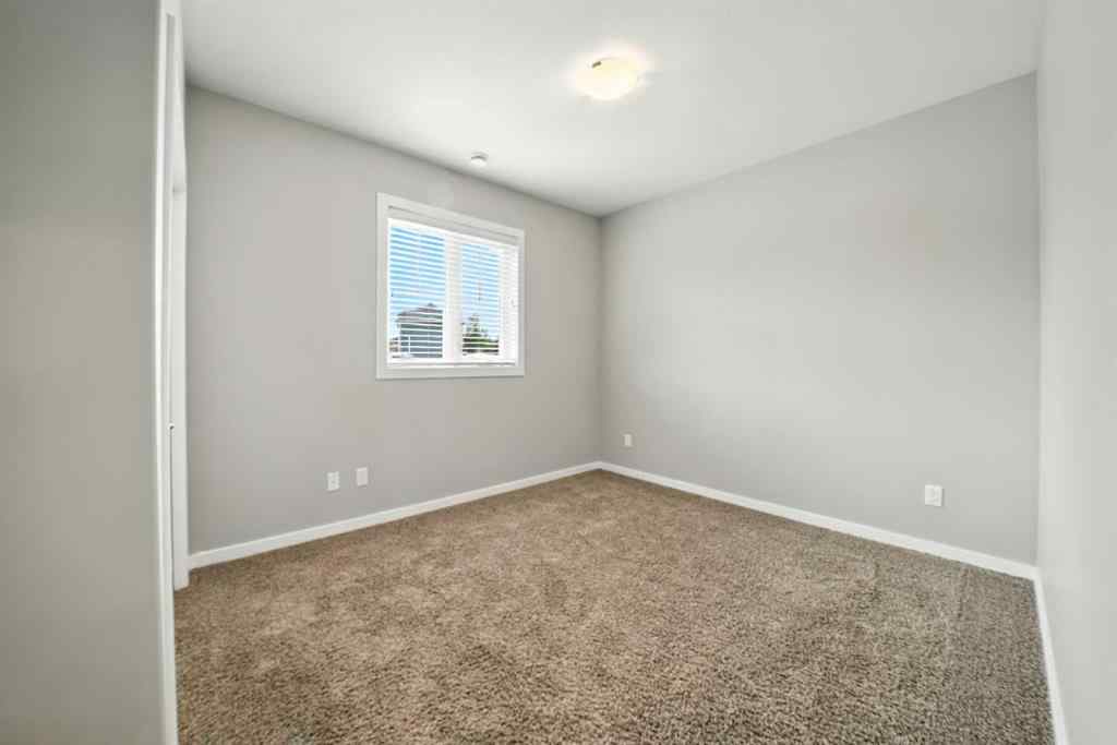 MLS® A2247626 - Unit #100 44 Reid Court  in Ryders Ridge Sylvan Lake, Residential