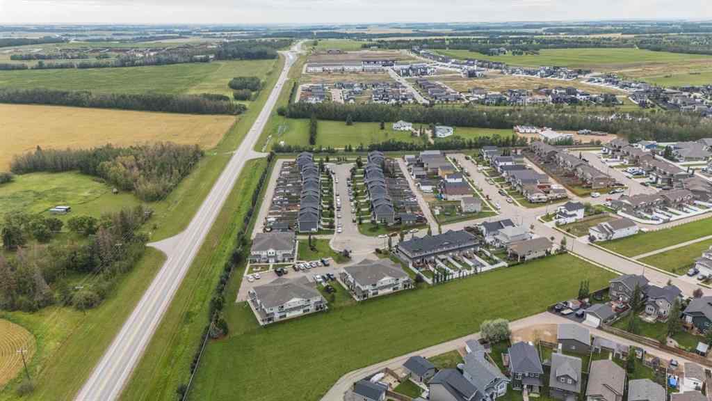 MLS® A2247626 - Unit #100 44 Reid Court  in Ryders Ridge Sylvan Lake, Residential
