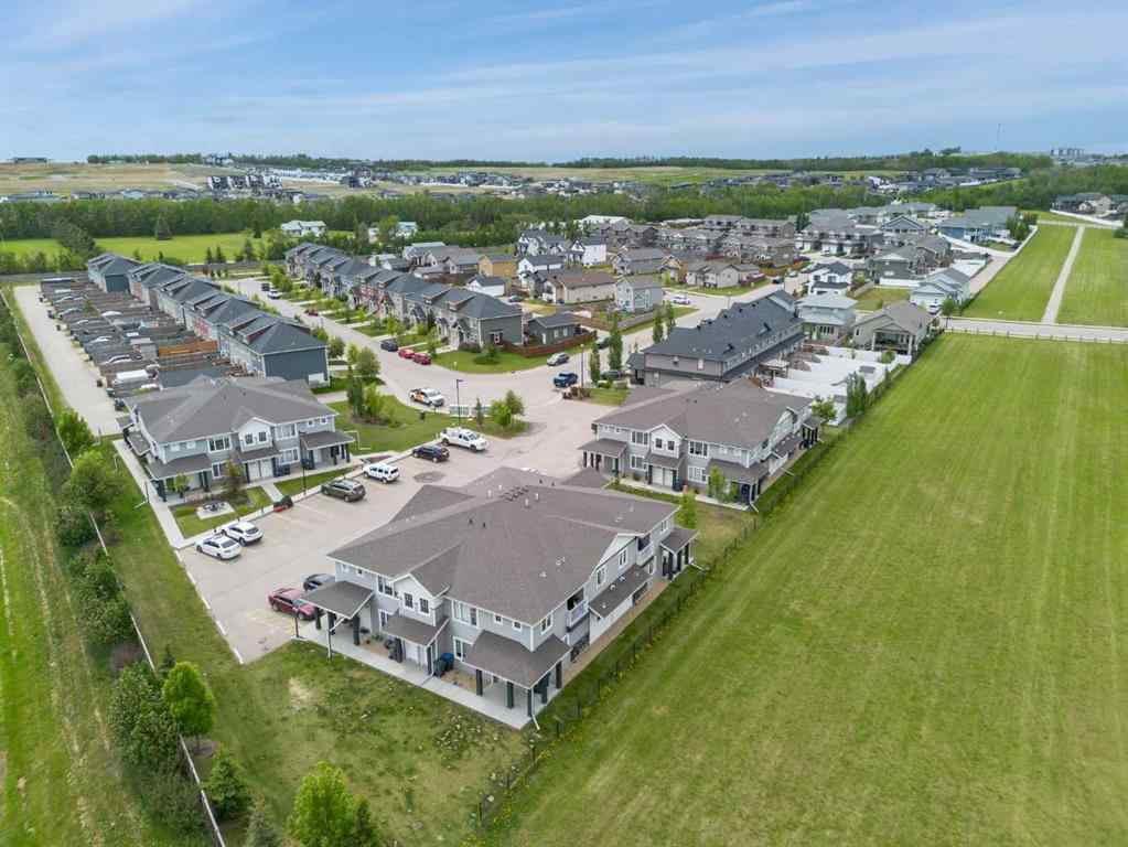 MLS® A2247626 - Unit #100 44 Reid Court  in Ryders Ridge Sylvan Lake, Residential