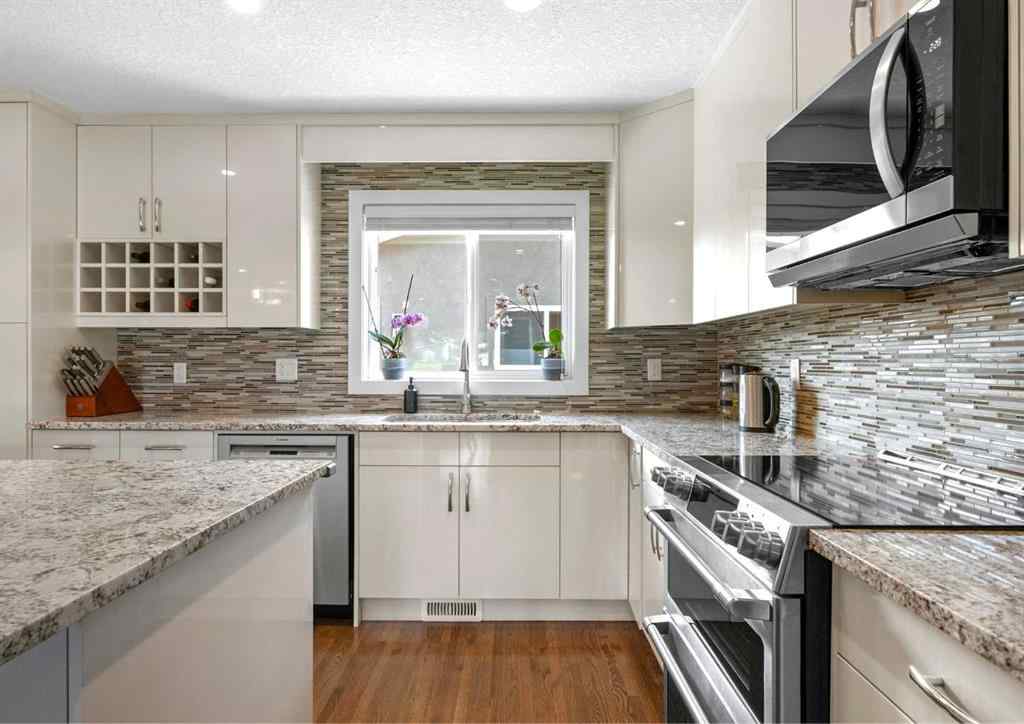 MLS® A2247634 - 1243 19 Street NE in Mayland Heights Calgary, Residential