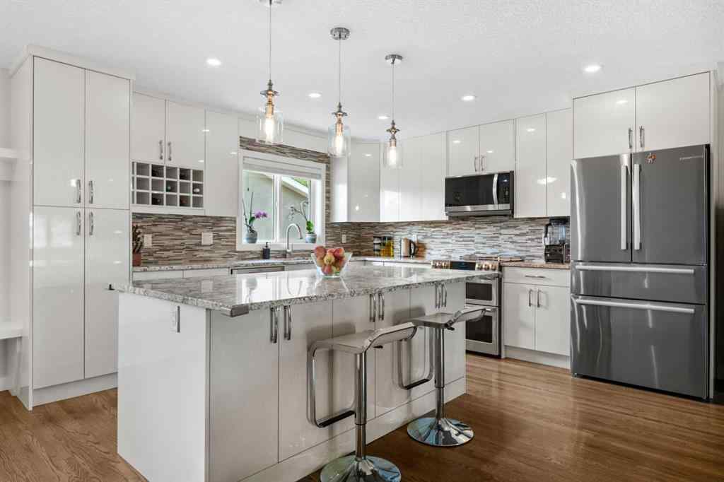 MLS® A2247634 - 1243 19 Street NE in Mayland Heights Calgary, Residential