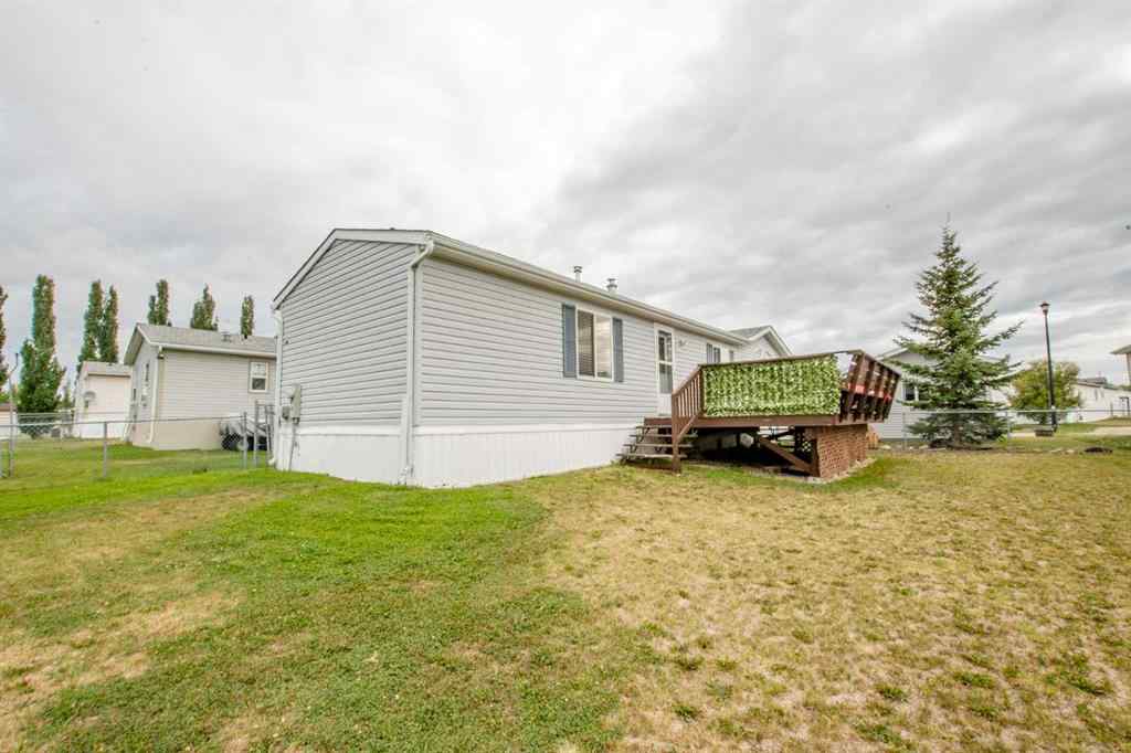 MLS® A2247640 - 423 Silver Point Drive  in MH - Silver Pointe Rural Grande Prairie No. 1, County of, Residential