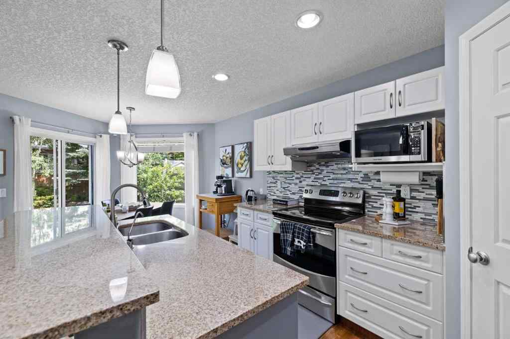 MLS® A2247644 - 154 Rocky Ridge Close NW in Rocky Ridge Calgary, Residential