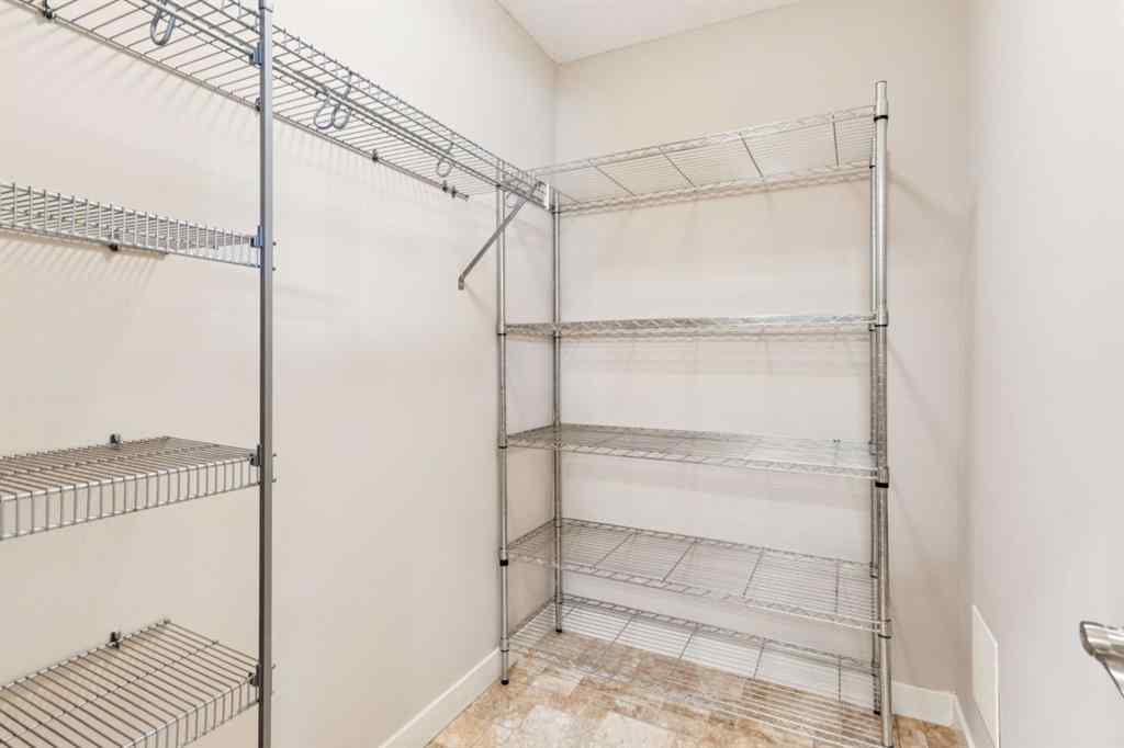 MLS® A2247660 - Unit #110 205 Sunset Drive  in Sunset Ridge Cochrane, Residential