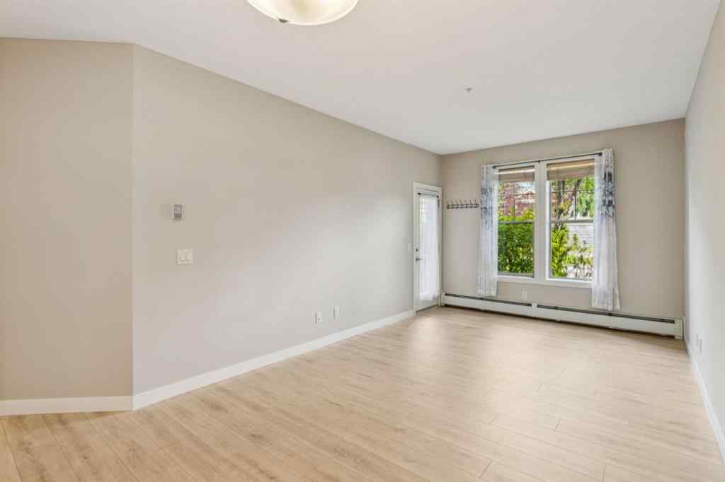 MLS® A2247660 - Unit #110 205 Sunset Drive  in Sunset Ridge Cochrane, Residential