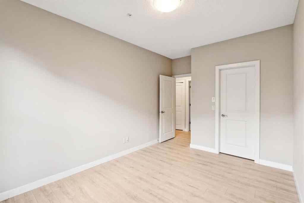 MLS® A2247660 - Unit #110 205 Sunset Drive  in Sunset Ridge Cochrane, Residential