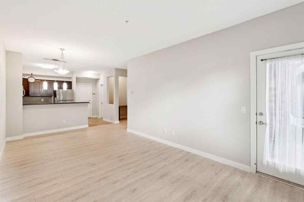 MLS® A2247660 - Unit #110 205 Sunset Drive  in Sunset Ridge Cochrane, Residential