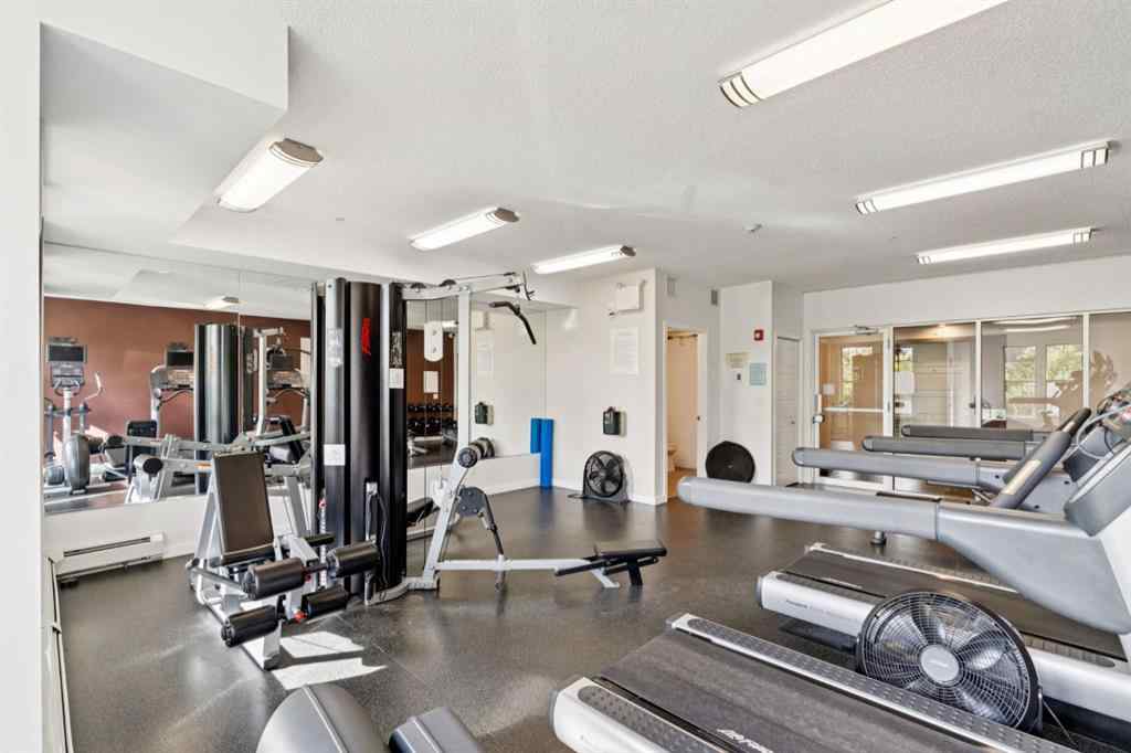 MLS® A2247660 - Unit #110 205 Sunset Drive  in Sunset Ridge Cochrane, Residential
