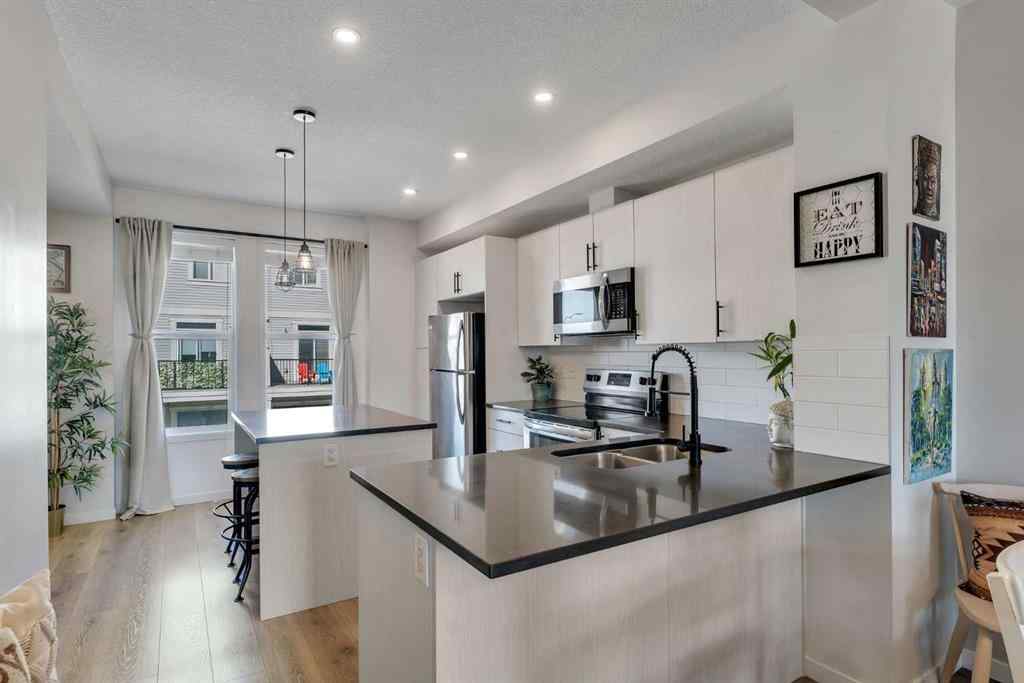 MLS® A2247668 - 302 South Point Square SW in South Point Airdrie, Residential