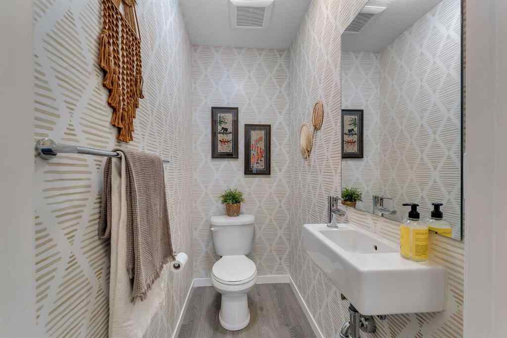 MLS® A2247668 - 302 South Point Square SW in South Point Airdrie, Residential