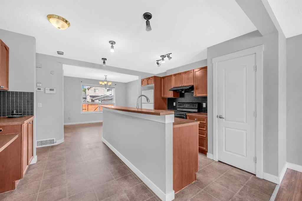 MLS® A2247718 - 9219 Saddlebrook Drive NE in Saddle Ridge Calgary, Residential