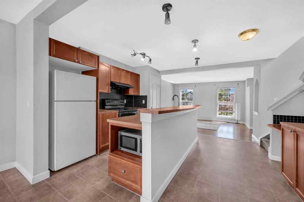 MLS® A2247718 - 9219 Saddlebrook Drive NE in Saddle Ridge Calgary, Residential