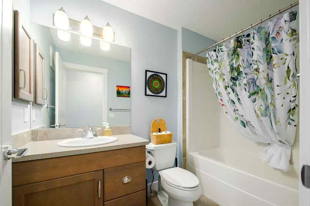 MLS® A2247739 - 84 Sunset Manor  in Sunset Ridge Cochrane, Residential