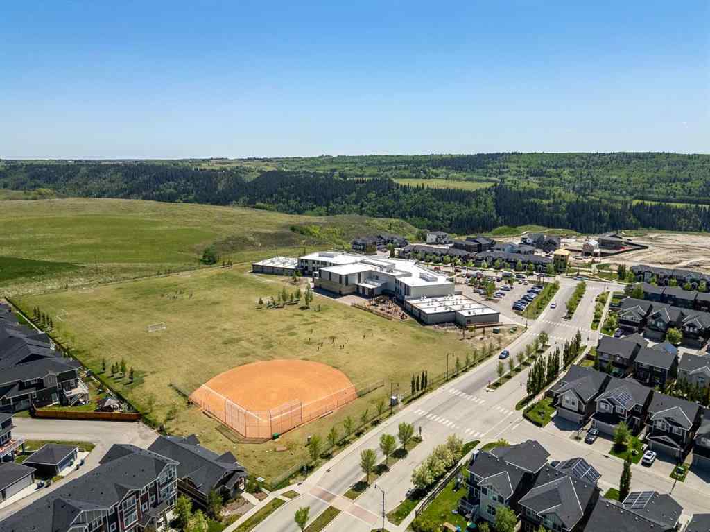 MLS® A2247739 - 84 Sunset Manor  in Sunset Ridge Cochrane, Residential