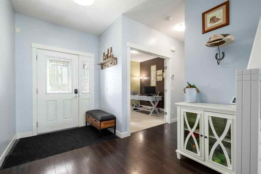 MLS® A2247739 - 84 Sunset Manor  in Sunset Ridge Cochrane, Residential