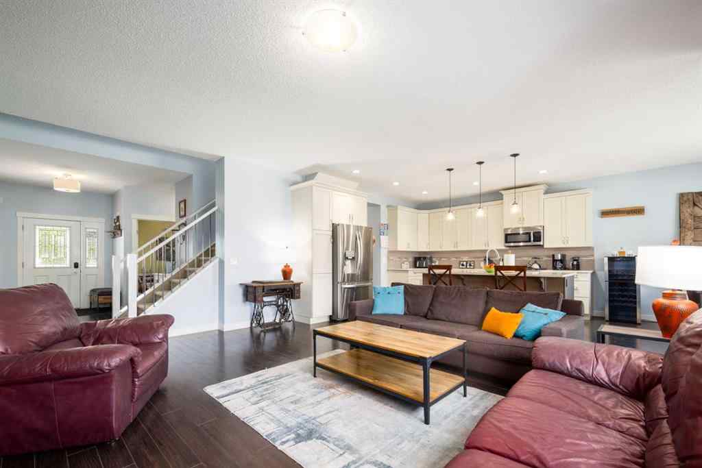MLS® A2247739 - 84 Sunset Manor  in Sunset Ridge Cochrane, Residential
