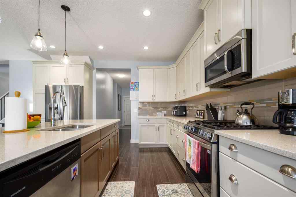 MLS® A2247739 - 84 Sunset Manor  in Sunset Ridge Cochrane, Residential