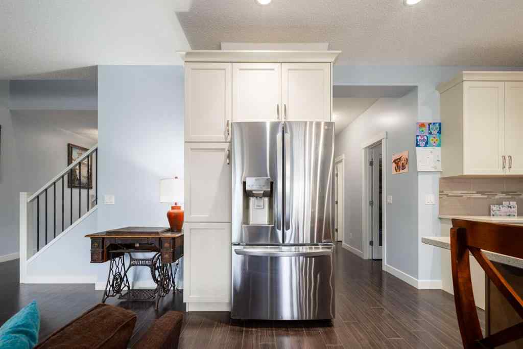 MLS® A2247739 - 84 Sunset Manor  in Sunset Ridge Cochrane, Residential