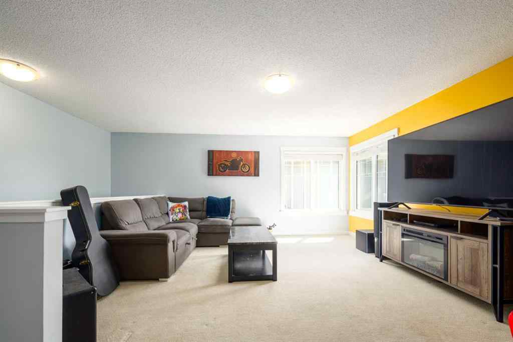 MLS® A2247739 - 84 Sunset Manor  in Sunset Ridge Cochrane, Residential