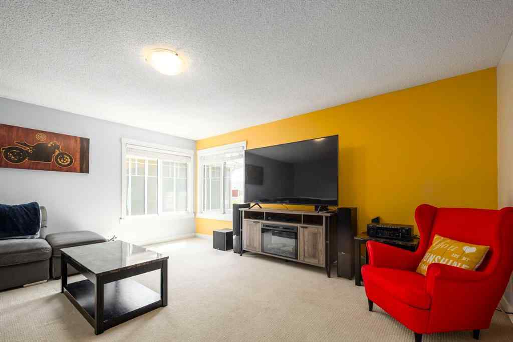 MLS® A2247739 - 84 Sunset Manor  in Sunset Ridge Cochrane, Residential
