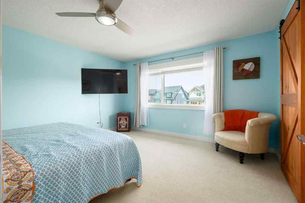 MLS® A2247739 - 84 Sunset Manor  in Sunset Ridge Cochrane, Residential