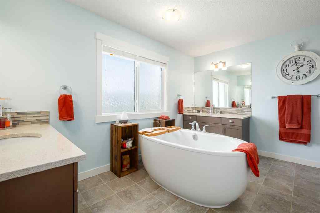 MLS® A2247739 - 84 Sunset Manor  in Sunset Ridge Cochrane, Residential