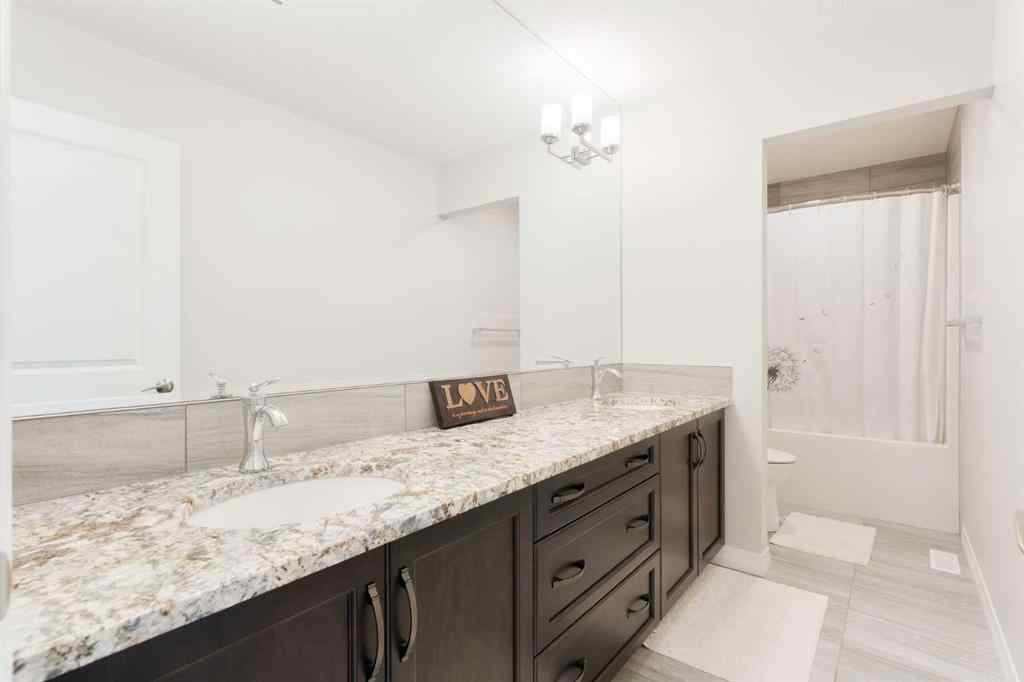 MLS® A2247770 - 308 Lucas Way NW in Livingston Calgary, Residential