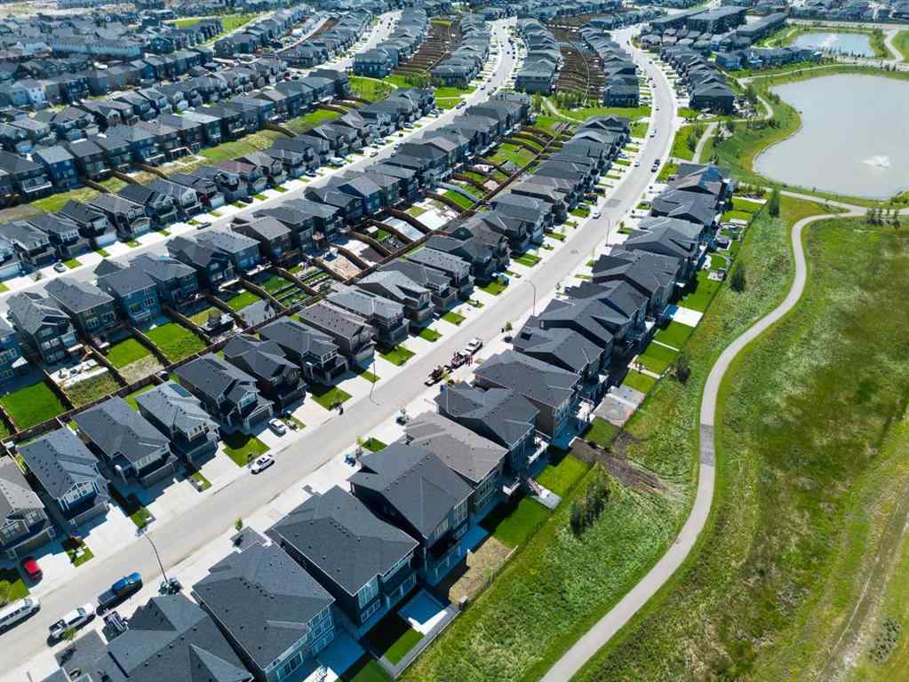 MLS® A2247770 - 308 Lucas Way NW in Livingston Calgary, Residential