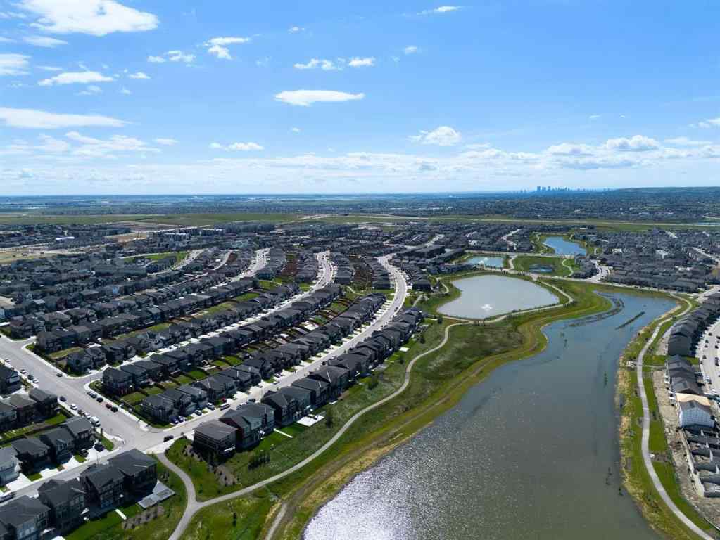 MLS® A2247770 - 308 Lucas Way NW in Livingston Calgary, Residential