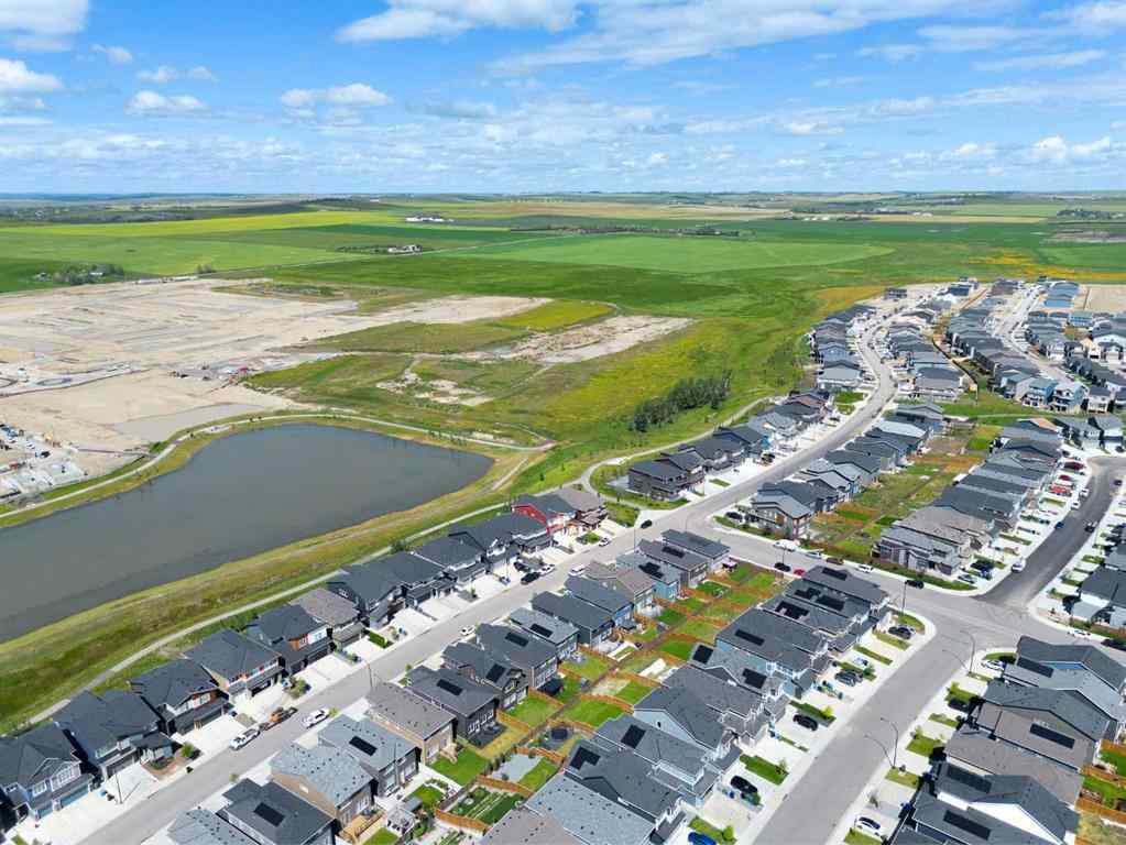 MLS® A2247770 - 308 Lucas Way NW in Livingston Calgary, Residential