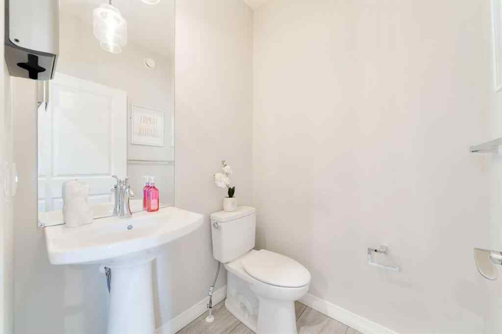MLS® A2247770 - 308 Lucas Way NW in Livingston Calgary, Residential