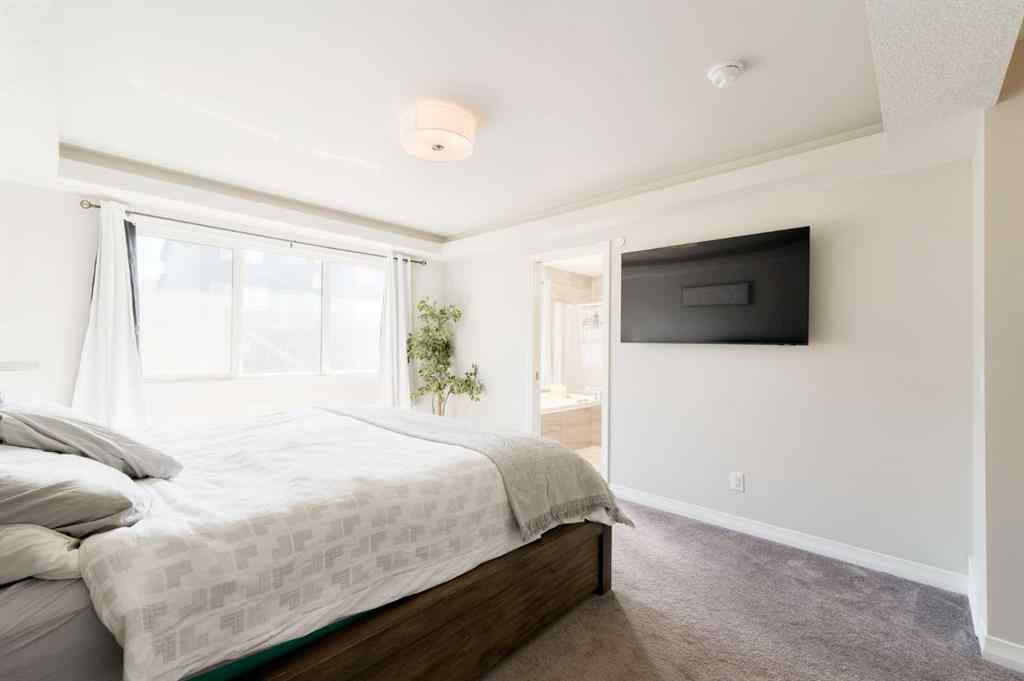 MLS® A2247770 - 308 Lucas Way NW in Livingston Calgary, Residential