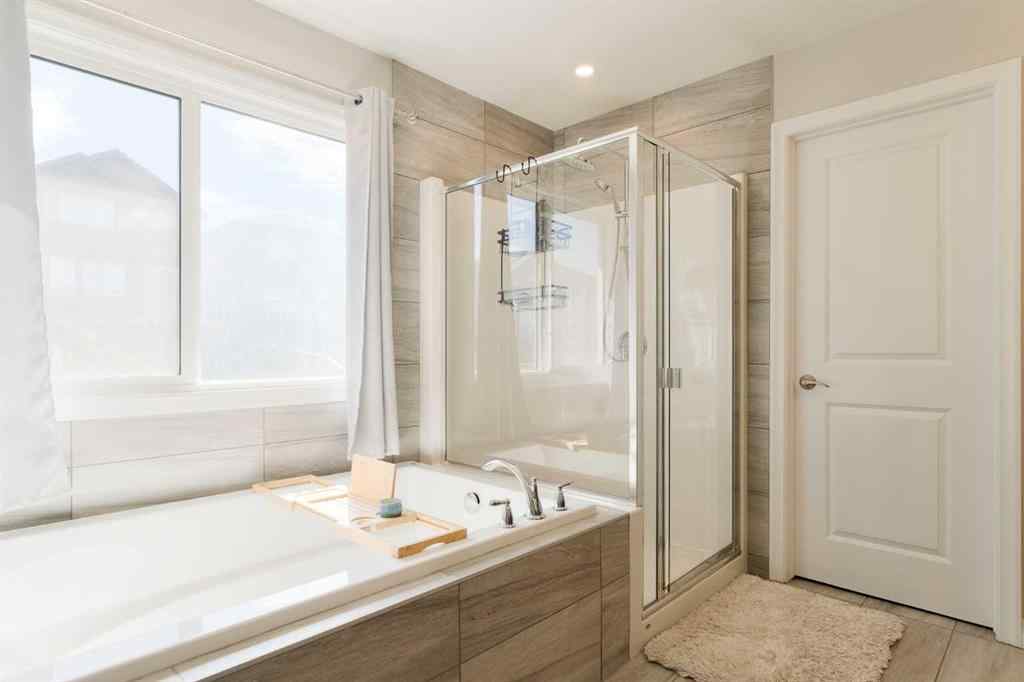 MLS® A2247770 - 308 Lucas Way NW in Livingston Calgary, Residential