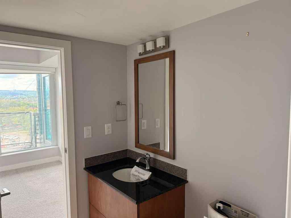 MLS® A2247812 - Unit #803 888 4 Avenue SW in Downtown Commercial Core Calgary, Residential