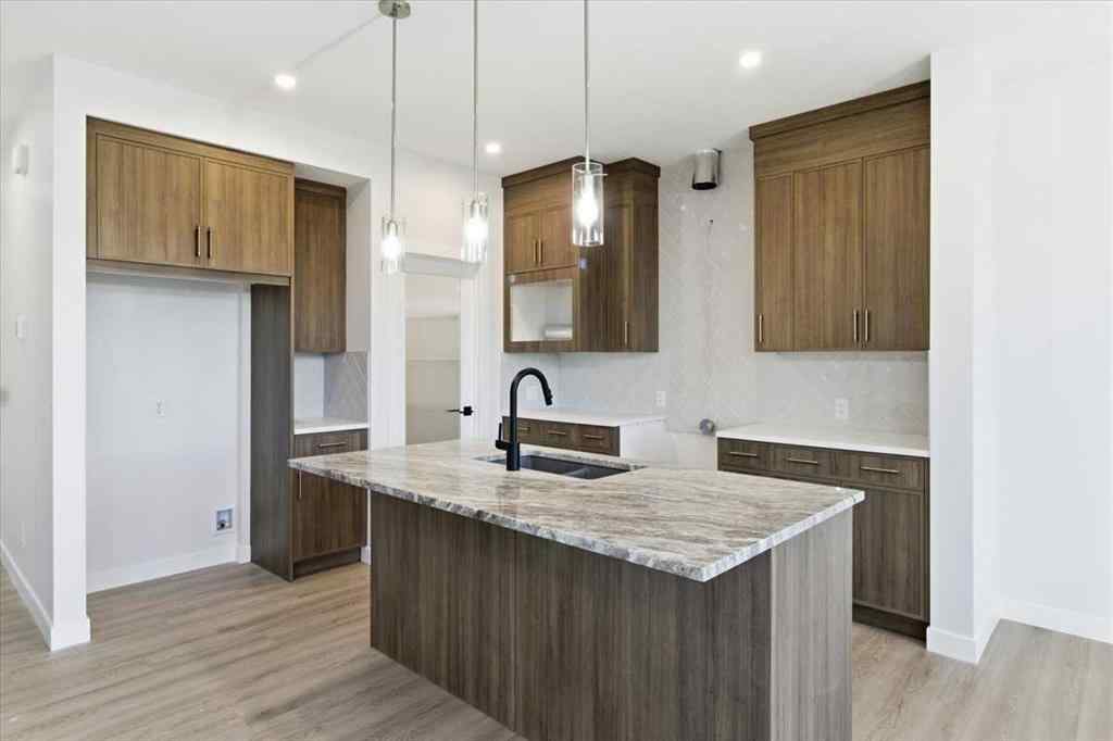 MLS® A2247814 - 217 Dawson Wharf Road  in Dawson\'s Landing Chestermere, Residential