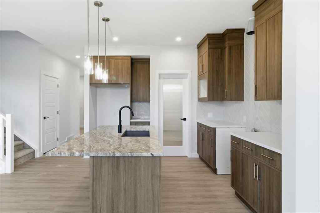 MLS® A2247814 - 217 Dawson Wharf Road  in Dawson\'s Landing Chestermere, Residential