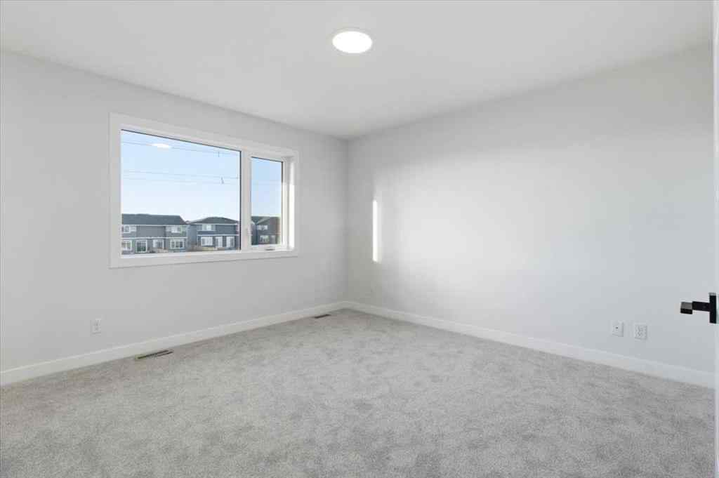 MLS® A2247814 - 217 Dawson Wharf Road  in Dawson\'s Landing Chestermere, Residential