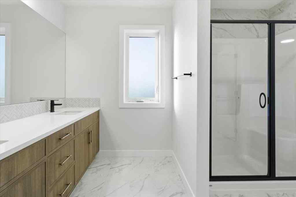 MLS® A2247814 - 217 Dawson Wharf Road  in Dawson\'s Landing Chestermere, Residential