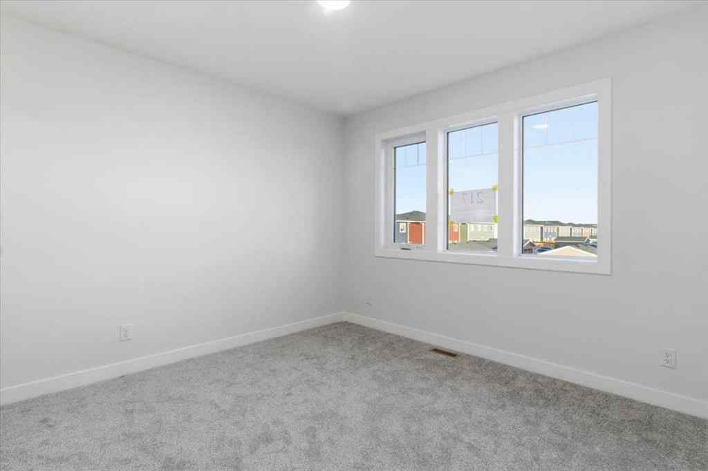 MLS® A2247814 - 217 Dawson Wharf Road  in Dawson\'s Landing Chestermere, Residential