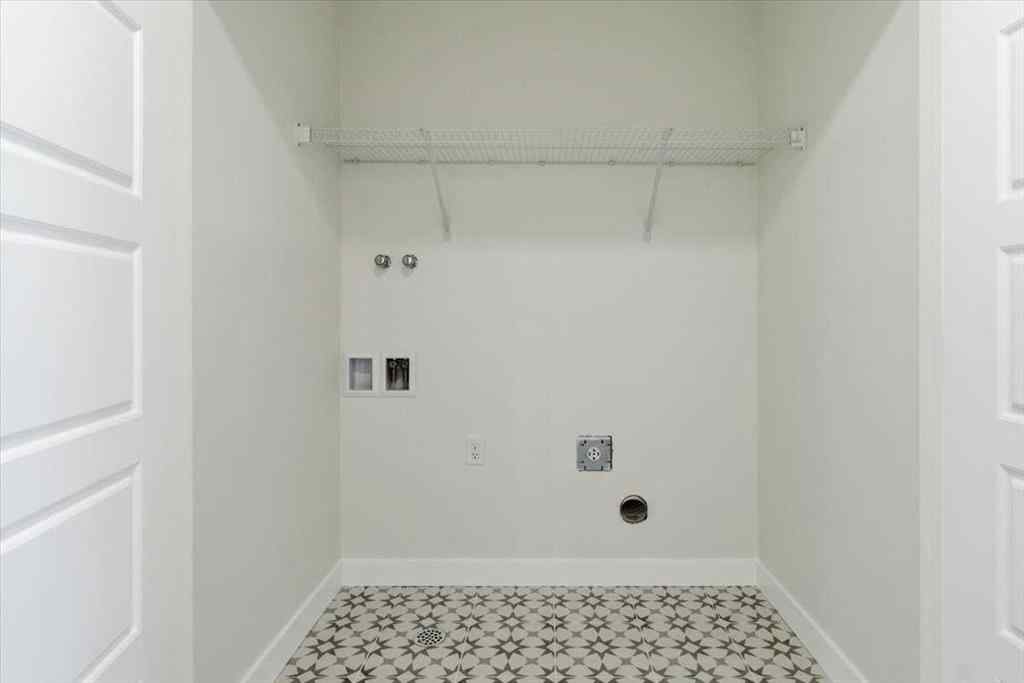 MLS® A2247814 - 217 Dawson Wharf Road  in Dawson\'s Landing Chestermere, Residential