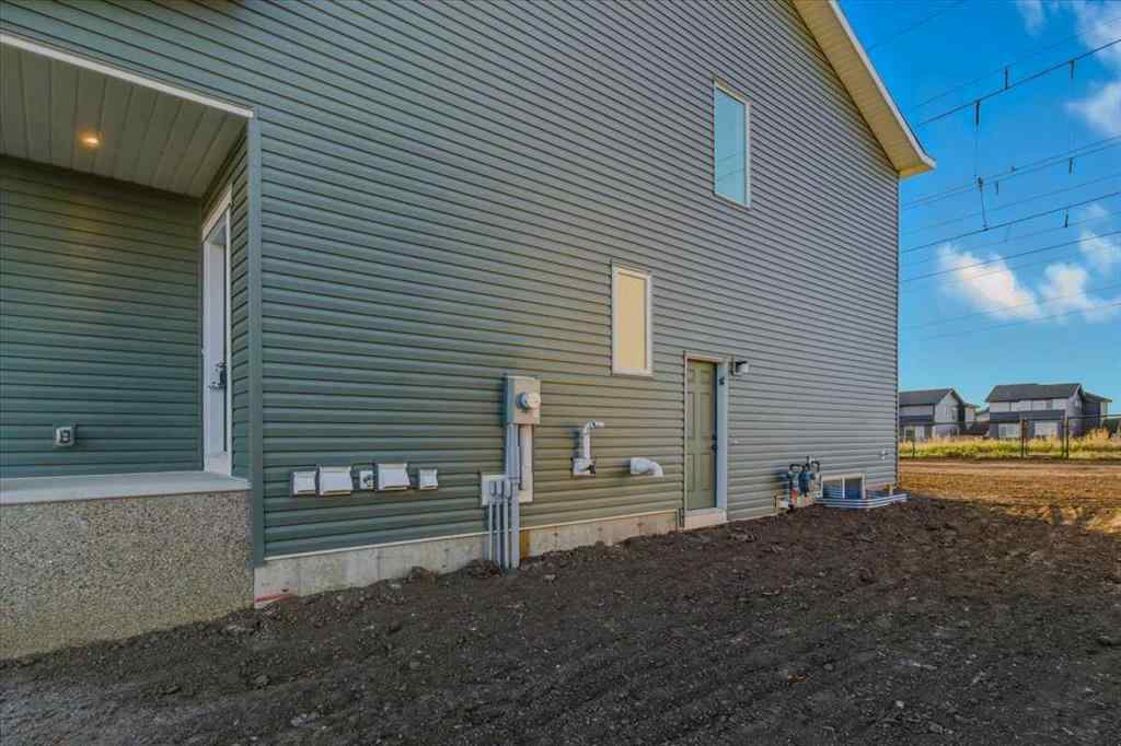 MLS® A2247814 - 217 Dawson Wharf Road  in Dawson\'s Landing Chestermere, Residential