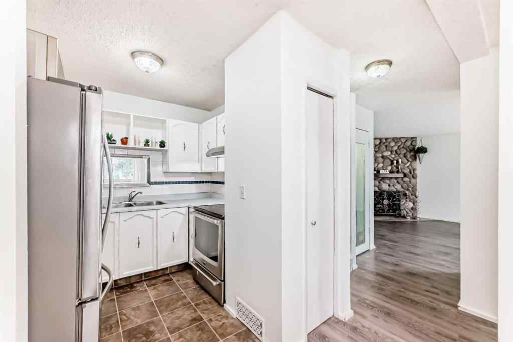 MLS® A2247820 - Unit #65 5520 1 Avenue SE in Penbrooke Meadows Calgary, Residential