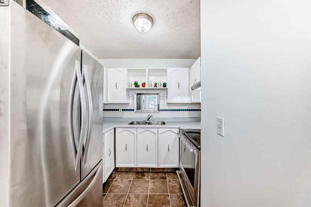 MLS® A2247820 - Unit #65 5520 1 Avenue SE in Penbrooke Meadows Calgary, Residential