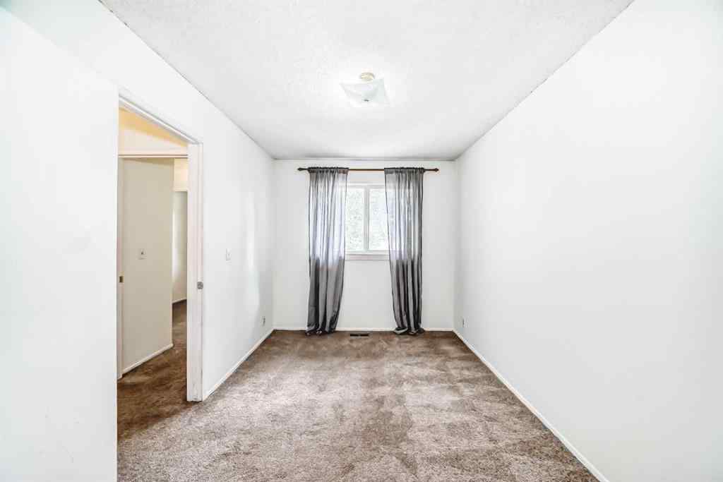 MLS® A2247820 - Unit #65 5520 1 Avenue SE in Penbrooke Meadows Calgary, Residential